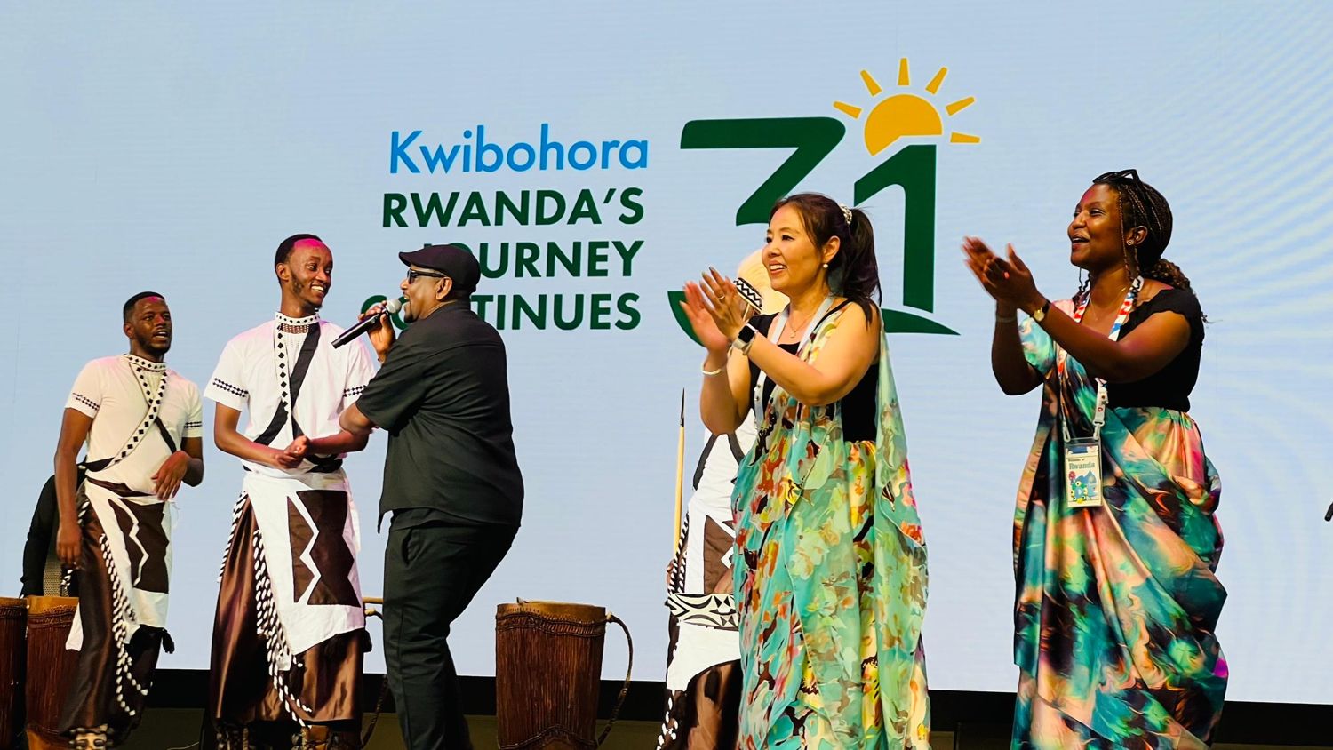 Celebrating Kwibohora 31 on stage with Rwandan performers