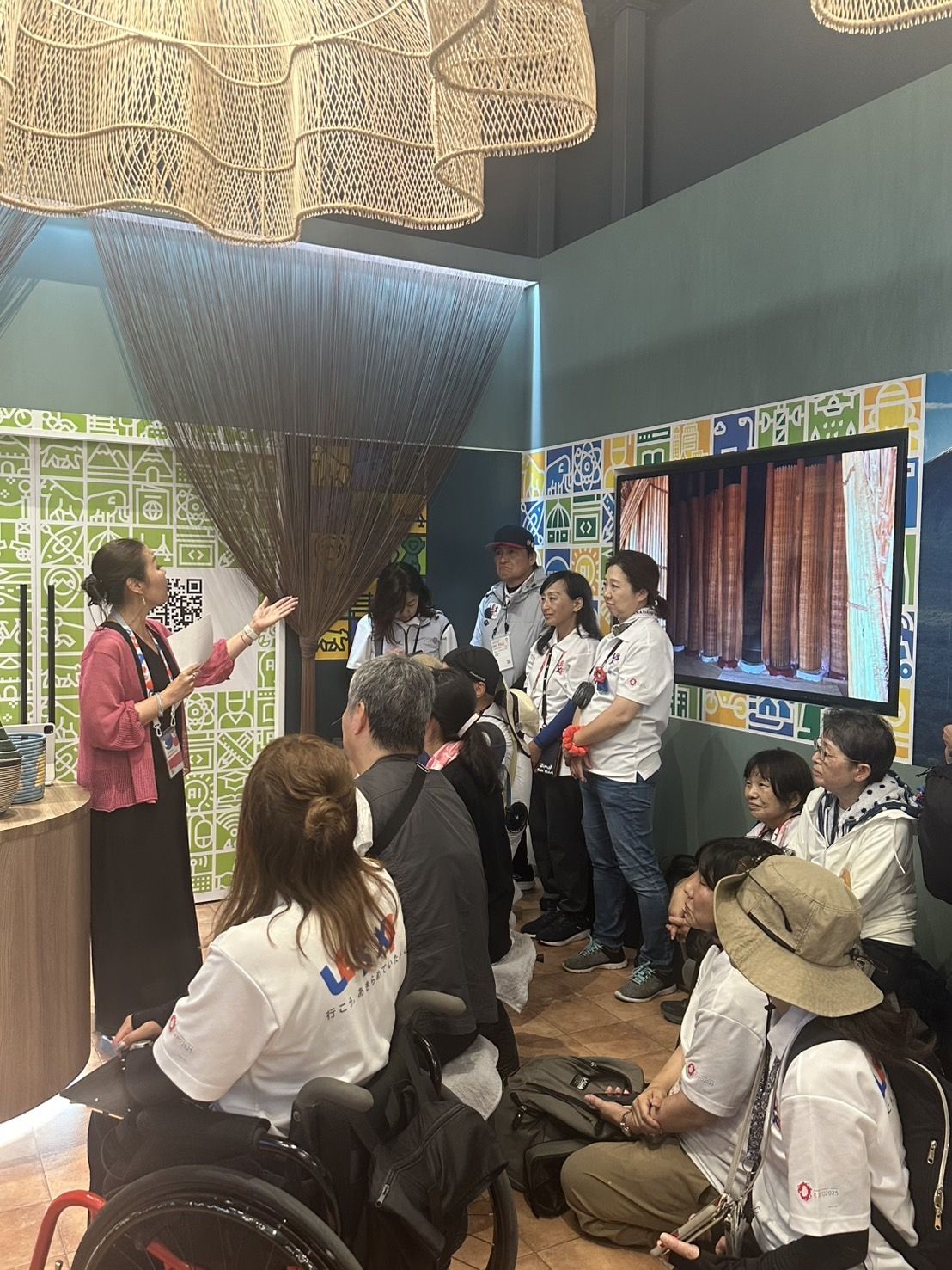 Chiaya Rawlins giving a lecture in the Rwanda Pavilion